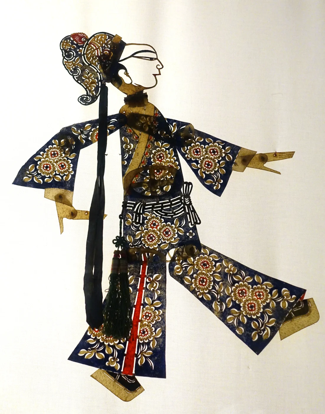 Qing-dynasty cowhide figures of Liang Shanbo and Zhu Yingtai displayed in the Sichuan Museum