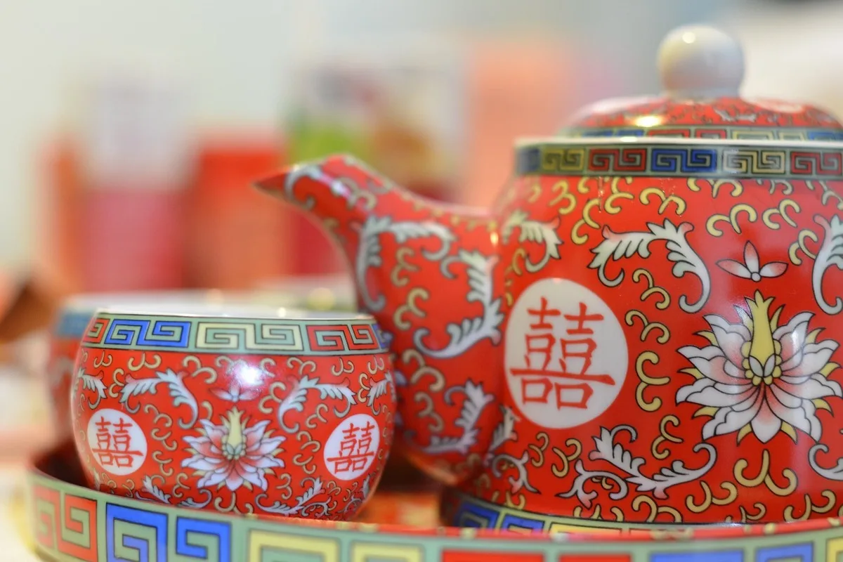 Red wedding tea set decorated with the gold double happiness character