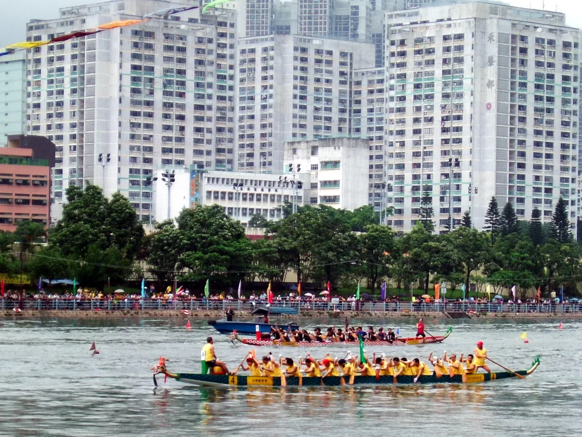 Dragon boats and teams racing on the Shing Mun River in Sha Tin, Hong Kong