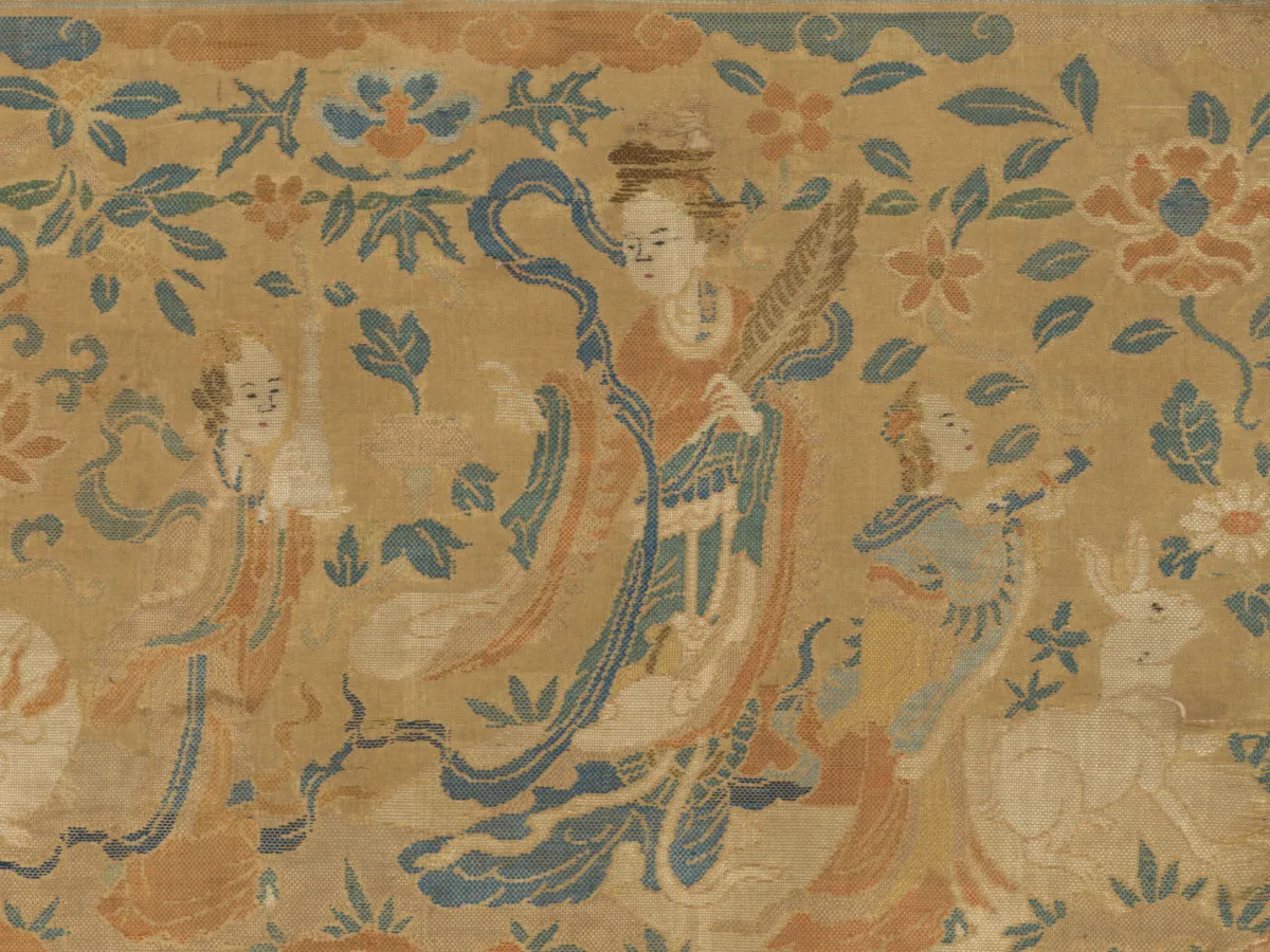 Detail of a Ming silk brocade showing Chang’e with an attendant and a rabbit
