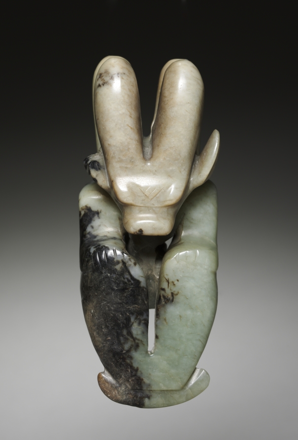 Nephrite figure with a bovine head